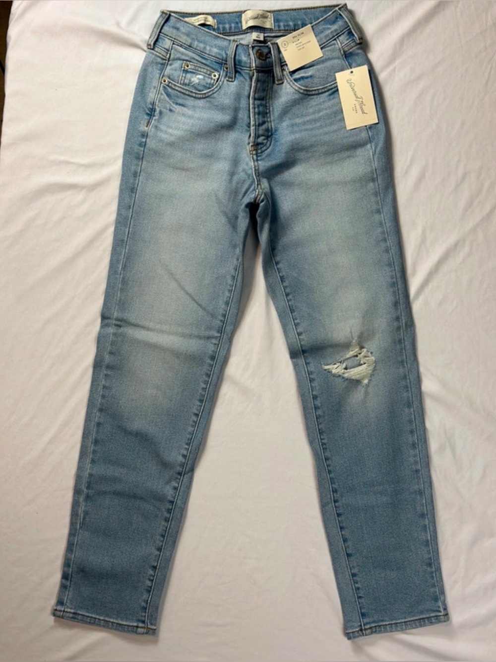 Light Wash Distressed 80’s Slim Mid-Rise Jeans